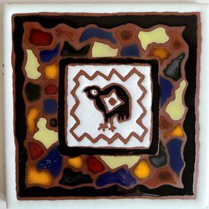 Decorative ceramic tile/trivet.